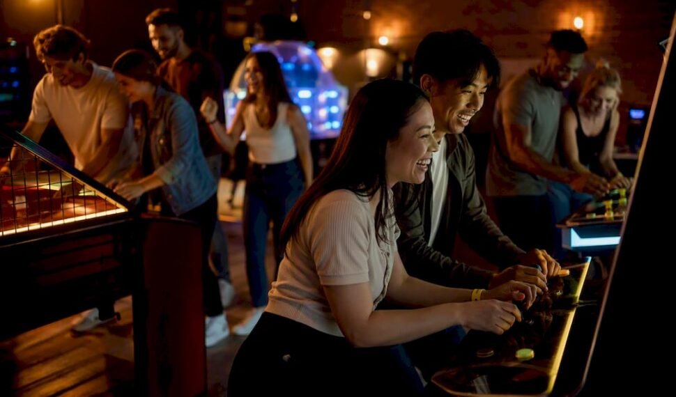 Friends enjoying an arcade group date