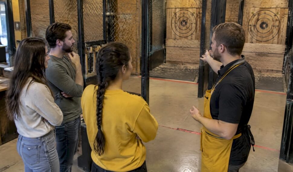 Friends choosing an axe throwing session