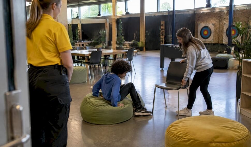 Children choosing comfortable seating at a party