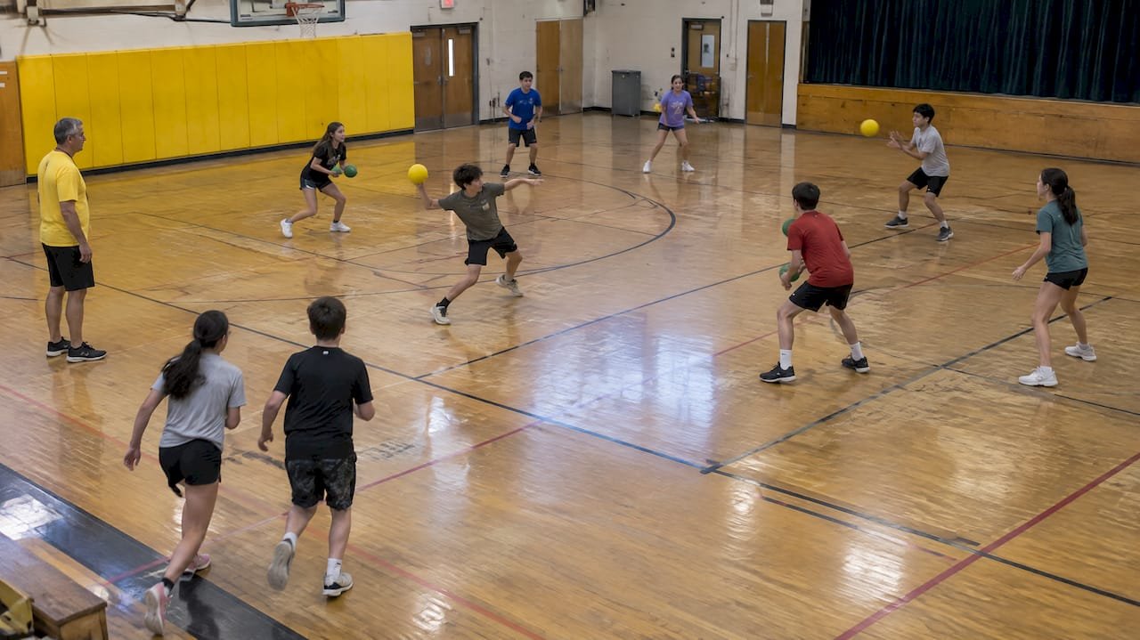 Youth players rejoin supervised foam dodgeball