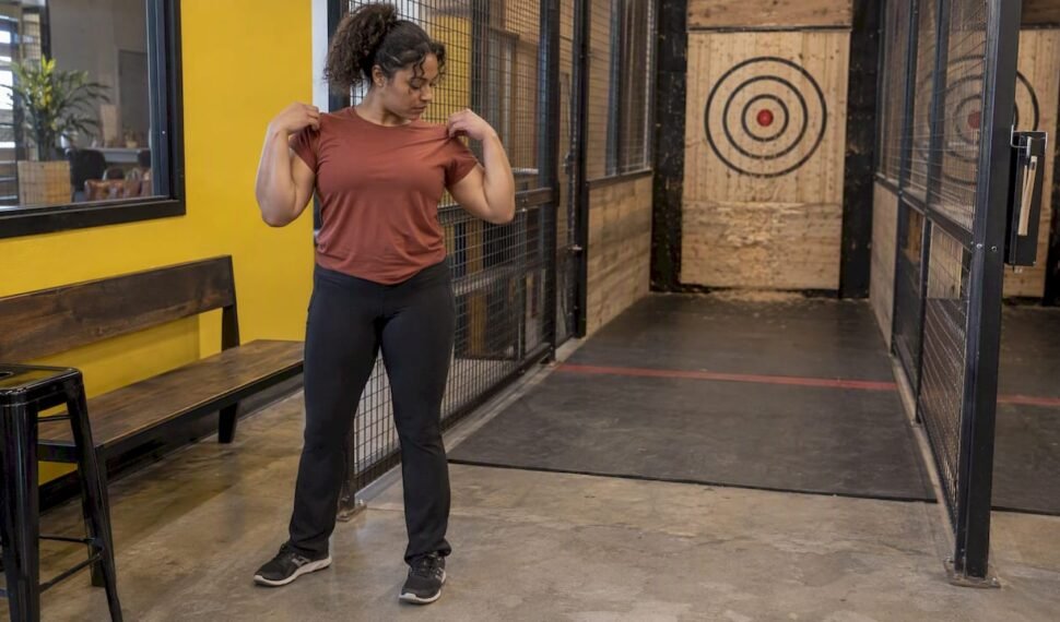 Participant wearing comfortable clothes at an axe venue